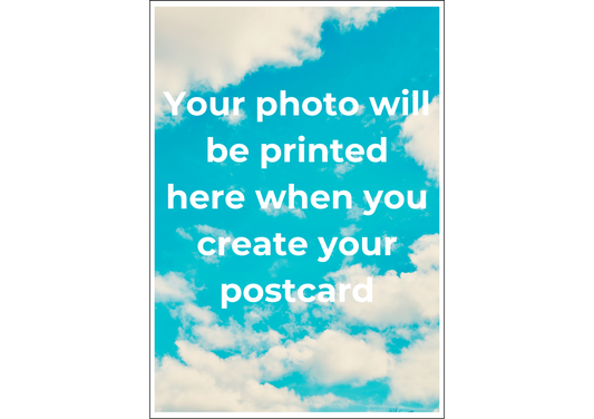 Placeholder postcard with blue sky and clouds and text 'Your photo will be printed here when you create your postcard'. This is a customisable photo postcard so your own photo will replace this image.