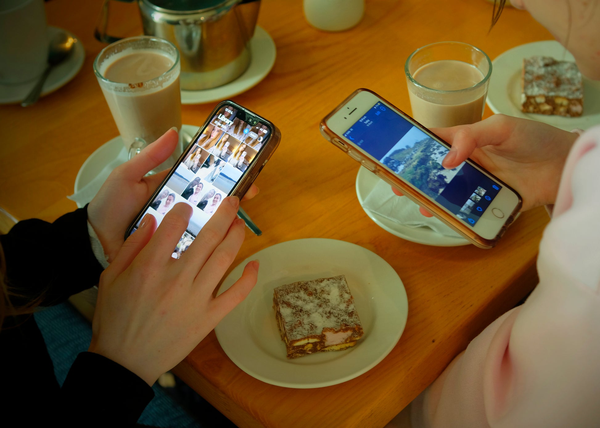 Participants choosing photos and creating their unique postcards over a cup of coffee after the photowalk