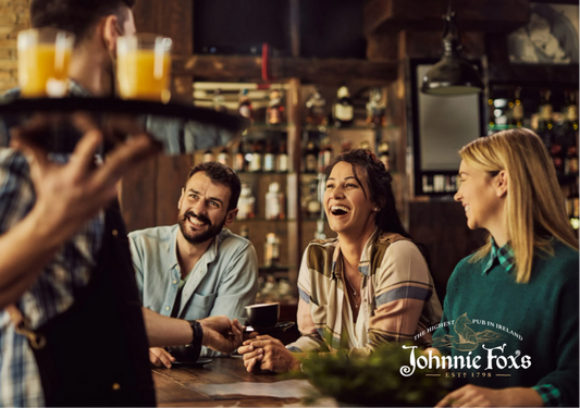 Sample selfie postcard of a group of friends enjoying drinks at Johnnie Fox's Pub