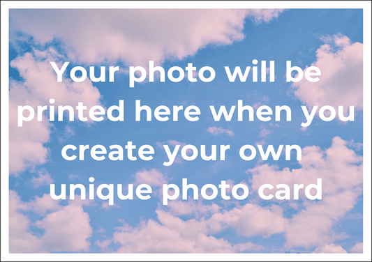 This is a simple placeholder image with text 'Your photo will be printed here when you create your own unique photo card' against a blue sky with clouds to illustrate where your own photo will be printed