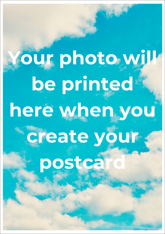Placeholder postcard with blue sky and clouds and text 'Your photo will be printed here when you create your postcard'. This is a customisable photo postcard so your own photo will replace this image.