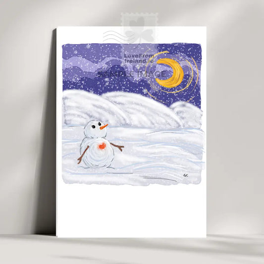 Adorable Snowman in love postcard depicting a snowman with a red heart in his chest looking at the moon. This card will be printed and posted on your behalf